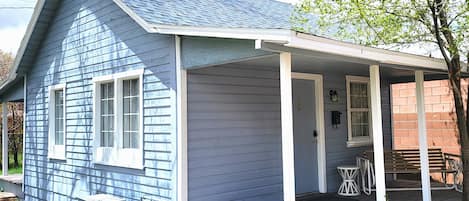 Cottage is a separate home with front and back porches