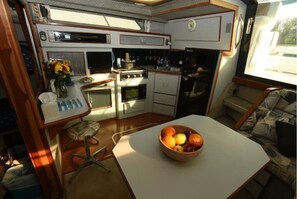 Galley has a refrigerator, microwave, small tv, Keurig and all kitchen supplies.