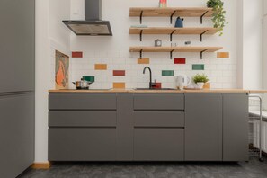 Cook and dine in style with the modern kitchenette and dining area.