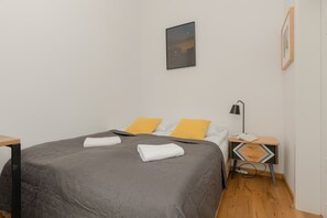 Enjoy the simplicity and comfort of the bedroom's modern design. 