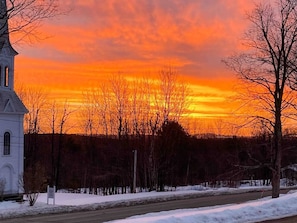 A winter sunrise view from the front of the library. 