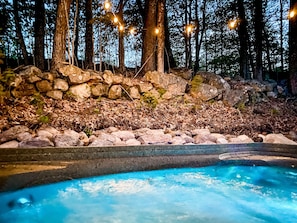 The perfect way to start or end your day - soaking in the hot tub while wrapped in nature. Covered by a pergola with clear roof, no need to worry about the weather ruining your hot tub time! 