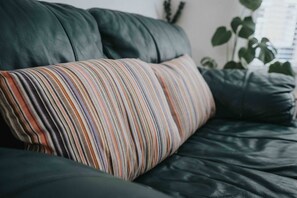Comfortable Living Space featuring:
- Comfortable seating and sofa bed
- Smart TV with Netflix
- Board games
