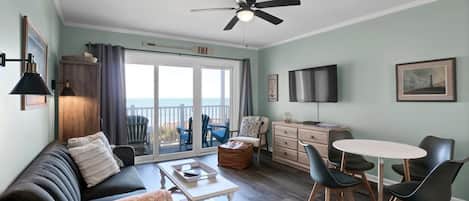 Bask in the beauty of dawn from our beachfront living room—a cozy retreat where every sunrise is a reminder of the enchanting rhythm of coastal living.