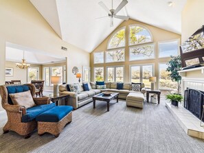 Living Room with Views of Pool and Golf Course at 30 Heath Drive