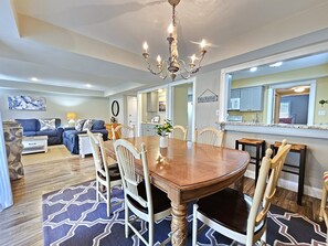 Dining Room and Kitchen with Breakfast Bar at 15 Fazio