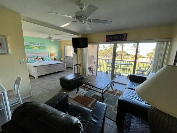 Master bedroom, living room, and balcony view. Movable partition wall open.