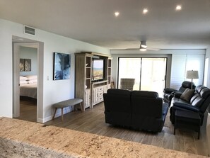 kitchen pass thru to living room with gulf views