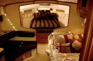 View from the cabin door showing the stateroom & dinette turned into a bed