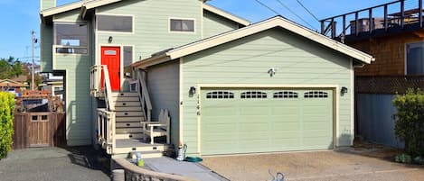 Front of home - double car garage & plenty of parking space