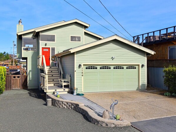 Front of home - double car garage & plenty of parking space