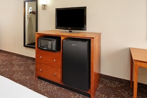 This unit comes w/ a TV, microwave, and a mini-fridge.