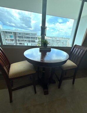 2 high stools chairs with city View