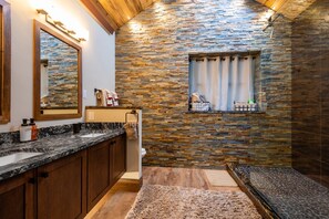 You will love the beautiful spa-like bathroom with its own radiant wall heater