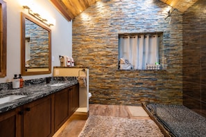 You will love the beautiful spa-like bathroom with its own radiant wall heater