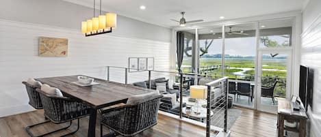 Incredible dining room view of the marsh. Imagine the sunsets you can see from this view!