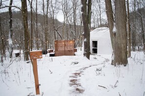 Snowy pathway and dome during the winter months. Make sure to bring your snow boots!