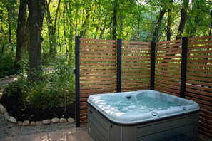 4 Person hot tub with privacy fence and lights to enjoy at night.