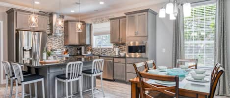 This brand new home features an open floor plan with beautiful island kitchen.