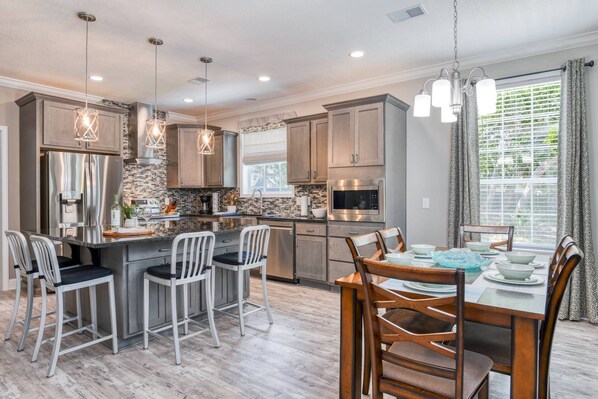 This brand new home features an open floor plan with beautiful island kitchen.