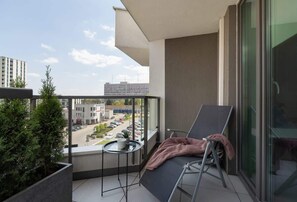 Private balcony with garden furniture, where you can relax.