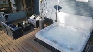 Sparkling clean hot tub on the deck of this Union Pier Vacation home