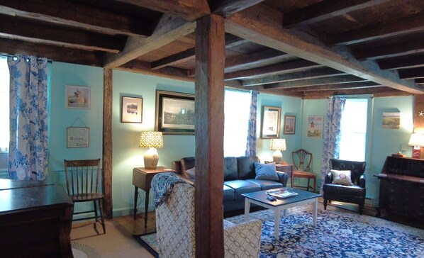 Open Living room dining room concept but old house built in 1718. 