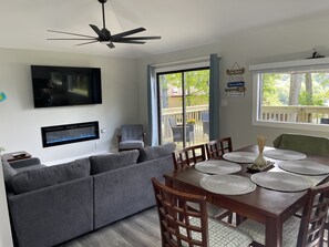 Open Living Area - HD Smart TV & Electric Fireplace, access onto deck