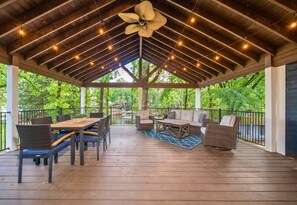 [Deck] Immerse Yourself in Tranquility and Relax on the Beautiful Outdoor Deck with Plenty of Seating for the Whole Group. 
