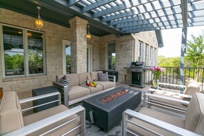 Gather around the firepit table with new comfortable seating.