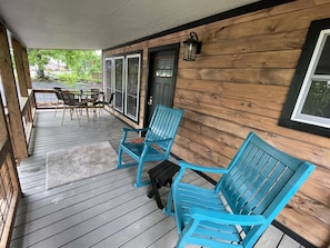 Enjoy the beautiful sunset and wildlife from the covered deck.