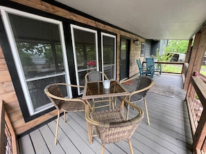 Enjoy the beautiful sunset and wildlife from the covered deck.