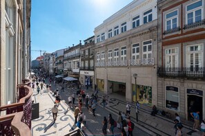 Balcony overlooking Porto's iconic Santa Catarina Street