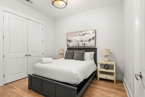 Bedroom #3 with queen bed, smart  TV, ensuite bathroom and closet