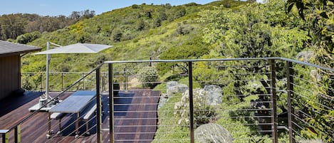 Landing above front door, outdoor dining, National Recreation Area beyond