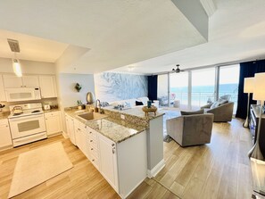Open concept chef kitchen with granite counter