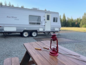 Picnic Table. Marshmallow Sticks provided. 
