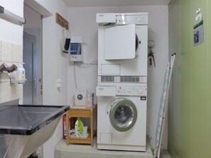 Laundry Room, Clothes Dryer, Washing Machine, Property, Laundry, Cabinetry, Home Appliance, Major Appliance, Gas