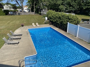View of the private in-ground pool from primary suite balcony.