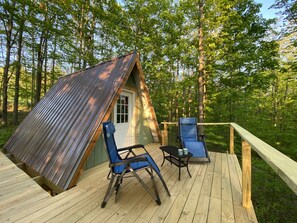 Cool elevated deck 14 feet off the ground with your zero gravity lounge chairs.