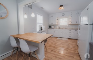 Kitchen with built-in dining island