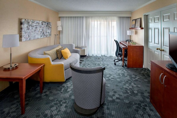 Living area. Exact unit will be assigned upon arrival. Views, colors, and decor may vary.