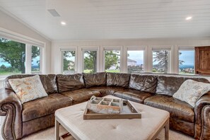 Living room with fireplace and scenic views