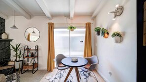 This sitting area is perfect for your morning coffee or a card game that is provided to our guests. 