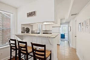 The common open dining area serves also as a good work from home station.