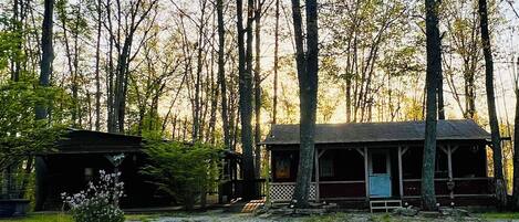 Front view of cabin and  building