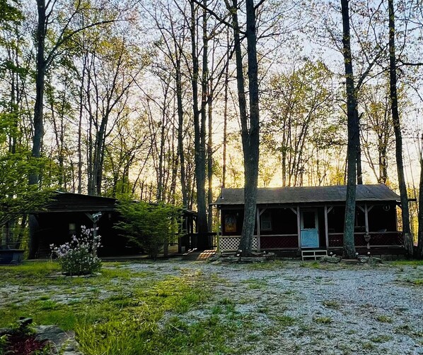 Front view of cabin and  building