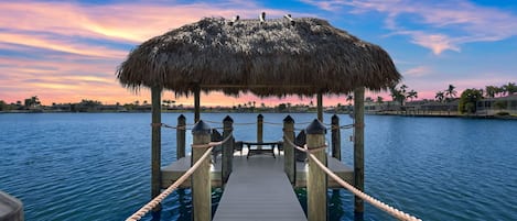 Watch the beautiful sunrise and sunsets daily from the private dock.