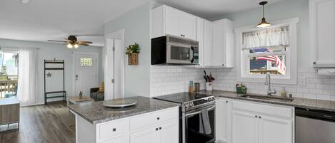 Cook up seaside delights in the kitchen of our coastal getaway's two-bedroom condo.