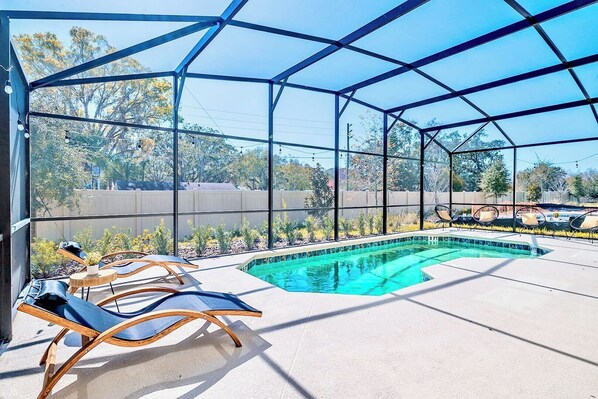Garden Facing Back Patio with Swimming Pool and Sundeck